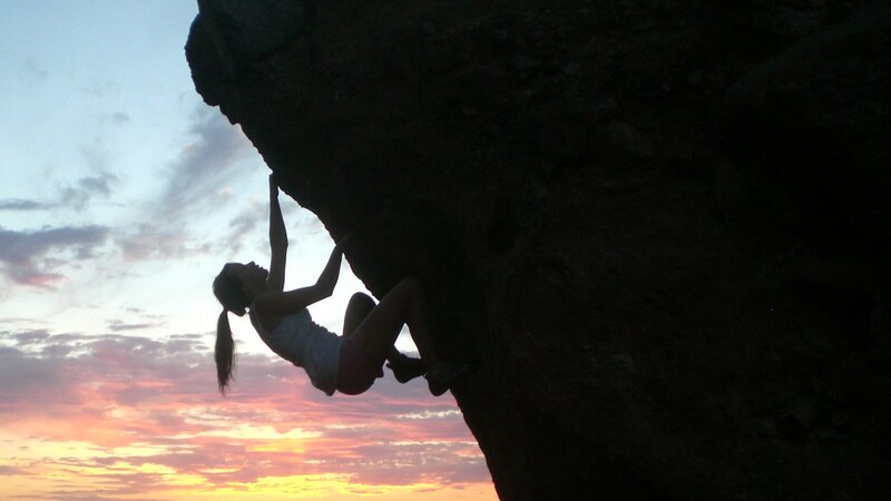 Silhouette of climber at sunset
