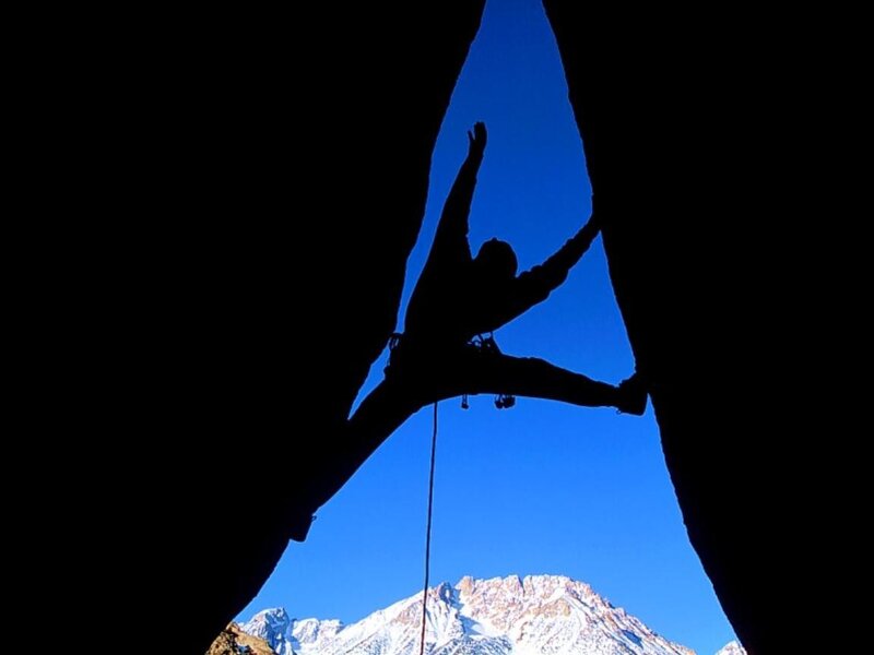 Silhouette of climber in a canyon