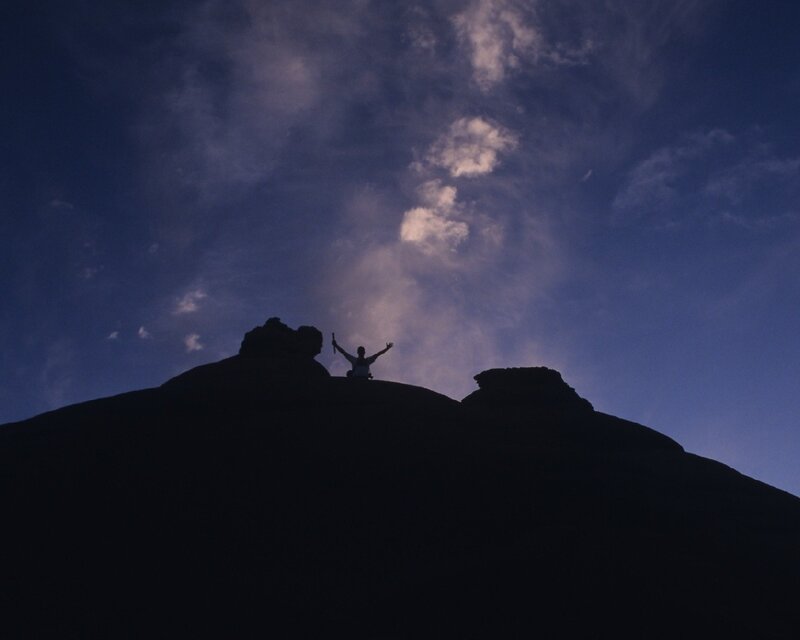 Silhouette of climber on rock