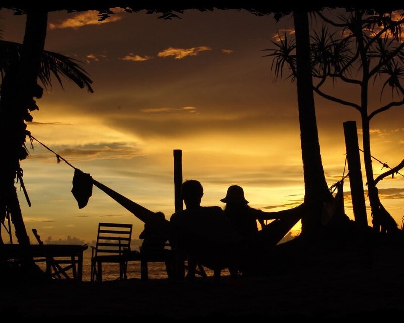 Silhouette of couple at sunset