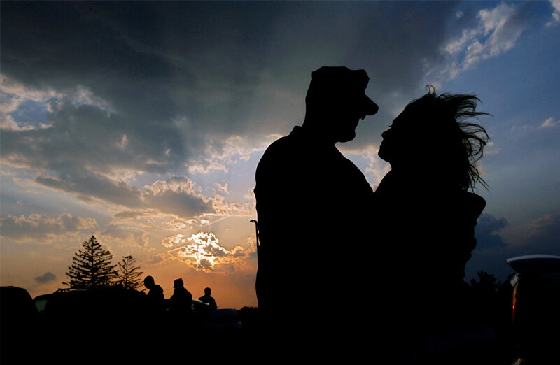 Silhouette of couple at sunset