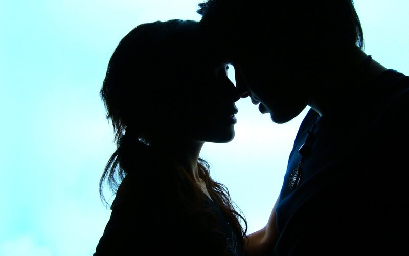 silhouette of couple embracing