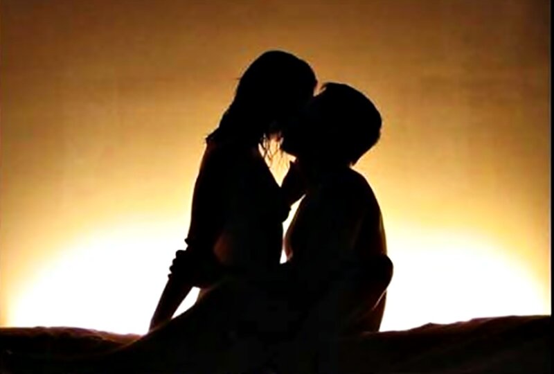 Silhouette of Couple Kissing — Yellow, Romantic