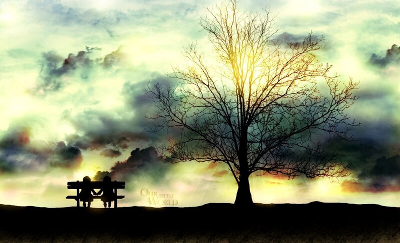 Silhouette of couple on bench