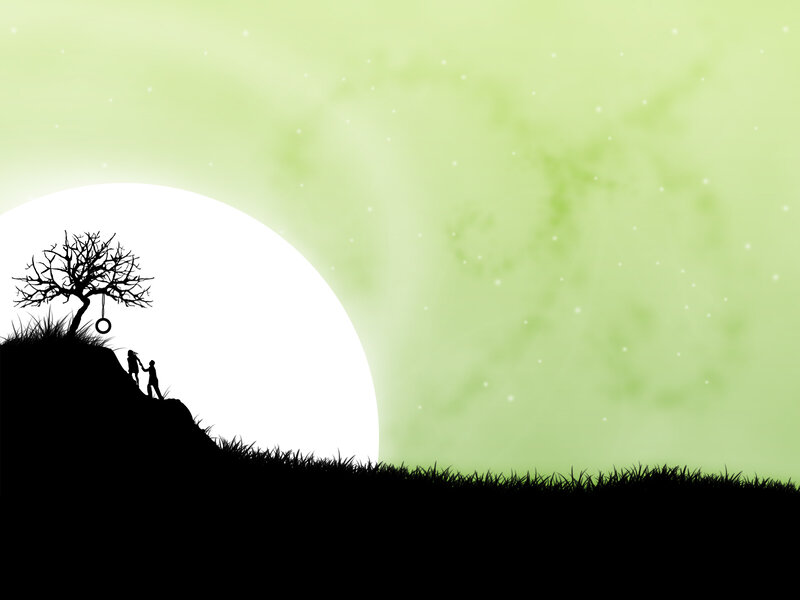 Silhouette of couple on hill