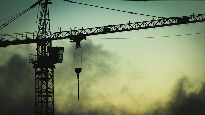 silhouette of crane at dusk