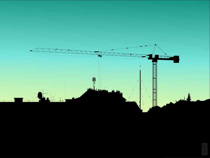 Silhouette of crane over rooftops