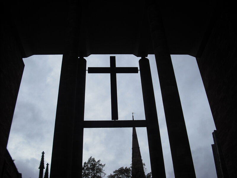 silhouette of cross and church spire