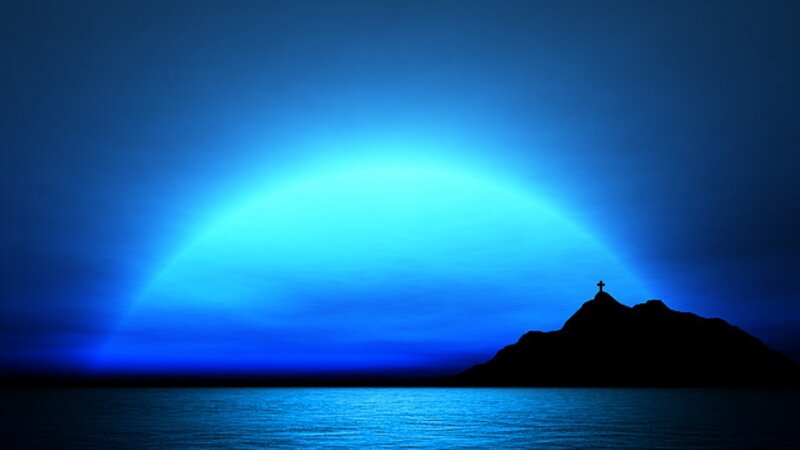 Silhouette of Cross on Hill — Blue