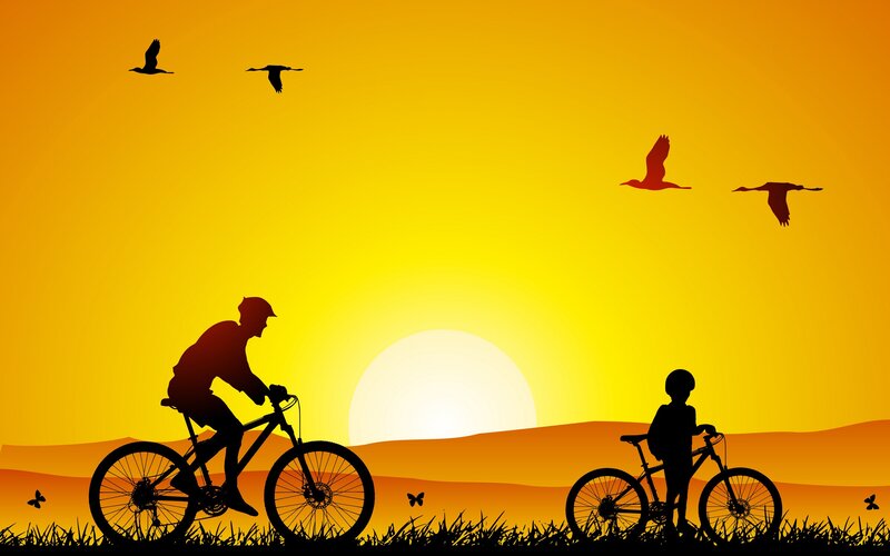 Silhouette of Cyclist and Child