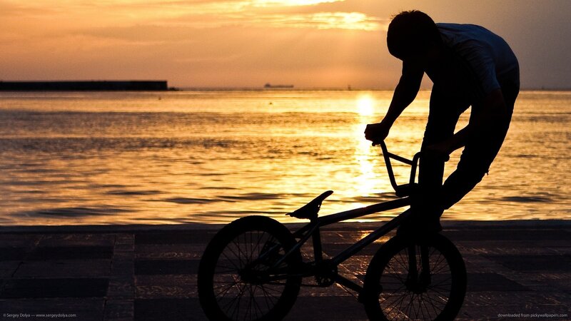 Silhouette of Cyclist — Gold, Dramatic, Sunset