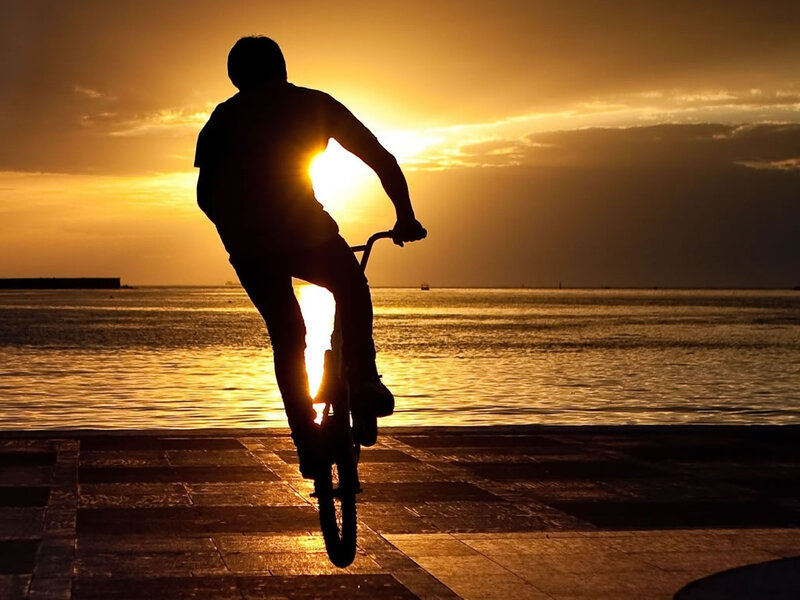 Silhouette of Cyclist — Gold