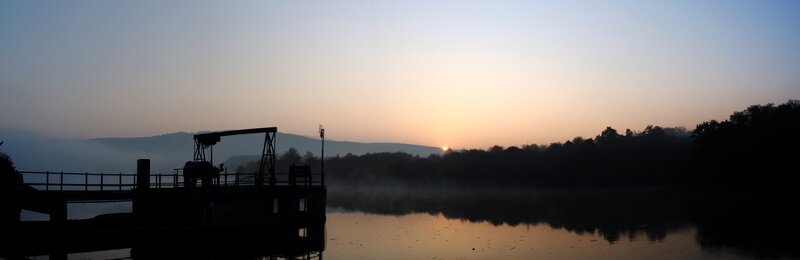 Silhouette of Dam at Sunrise