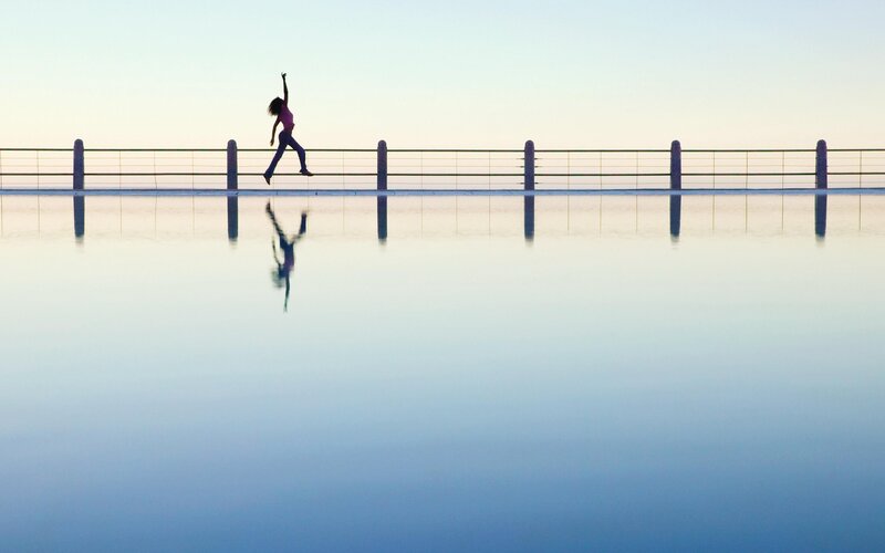 Silhouette of dancer at sunset
