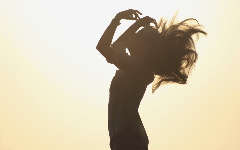 silhouette of dancer at sunset