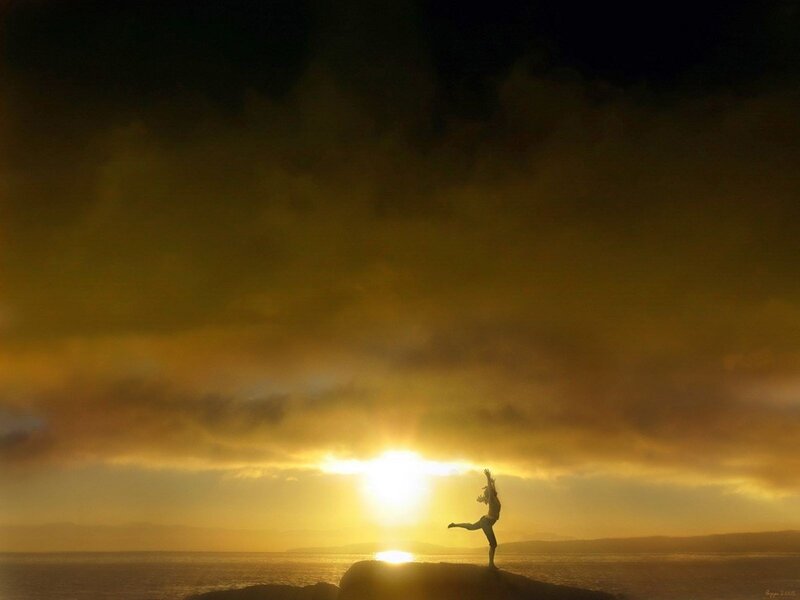 Silhouette of dancer at sunset