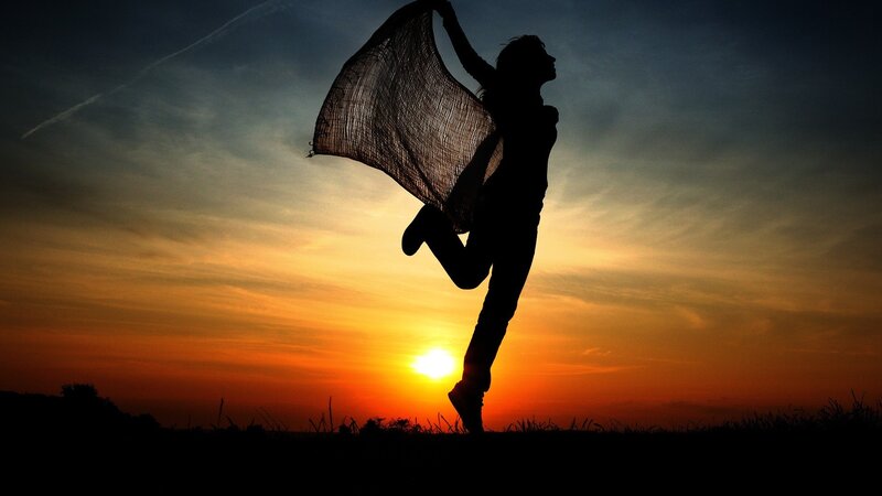 Silhouette of dancer at sunset