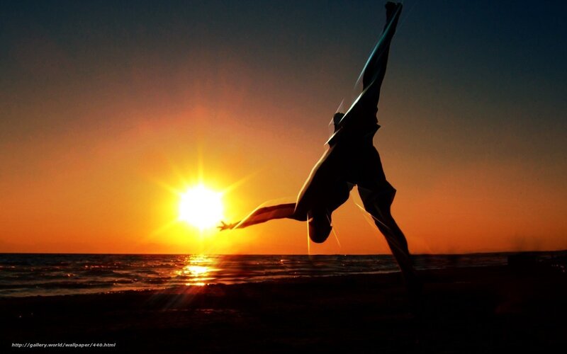 Silhouette of dancer at sunset
