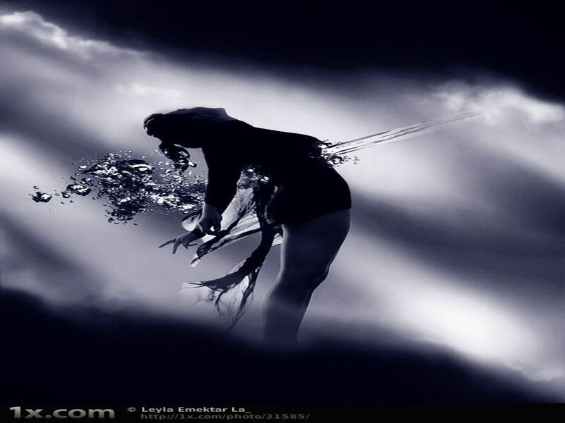 silhouette of dancer in water