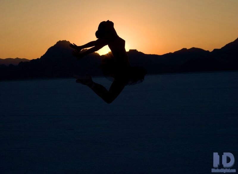 Silhouette of Dancer Jumping — Orange