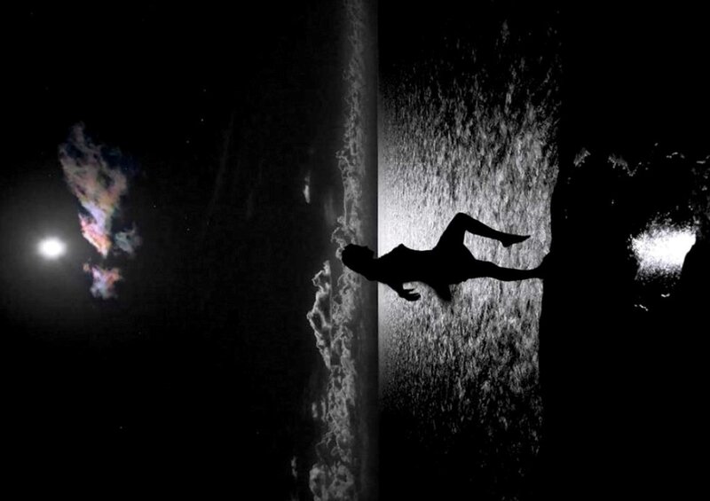 silhouette of diver at night