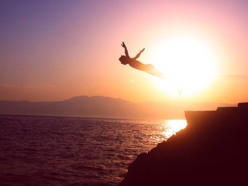 Silhouette of diver at sunset