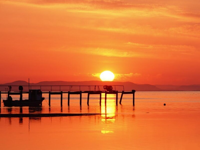 Silhouette of Dock at Sunset