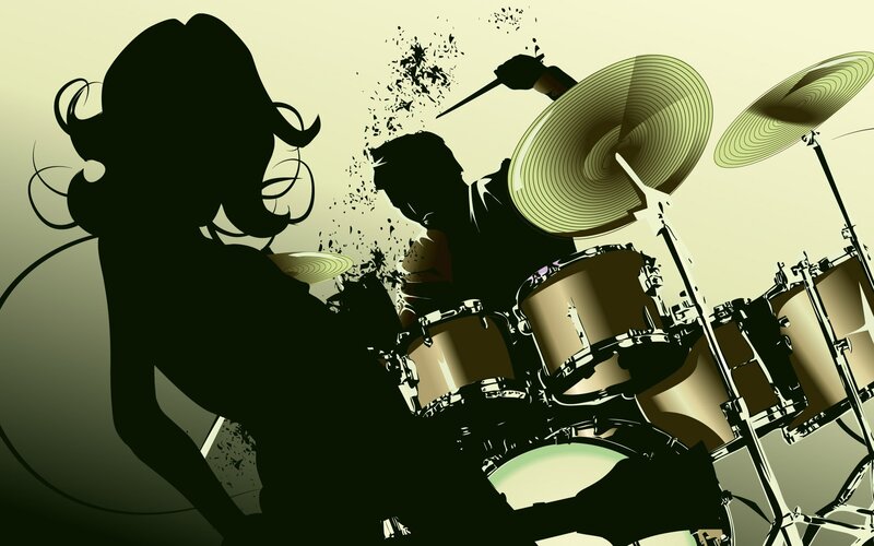 silhouette of drummer and dancer