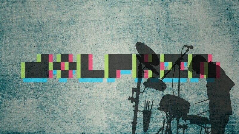 silhouette of drummer with glitch effect