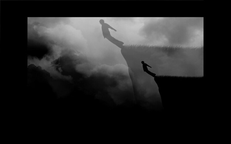 Silhouette of falling figures