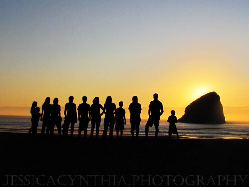 Silhouette of family at sunset