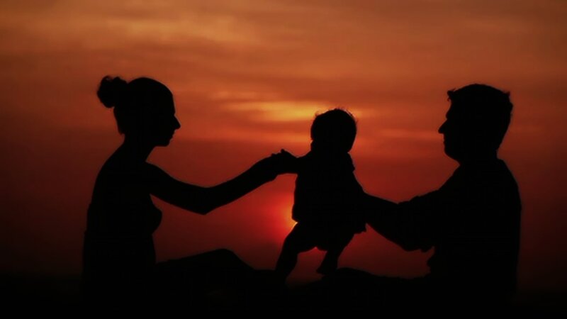 Silhouette of Family — Orange, Serene
