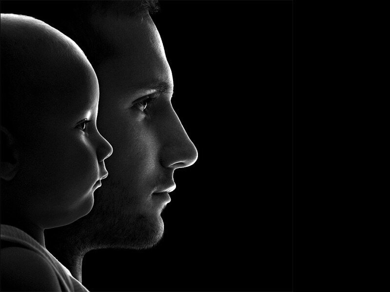 silhouette of father and child
