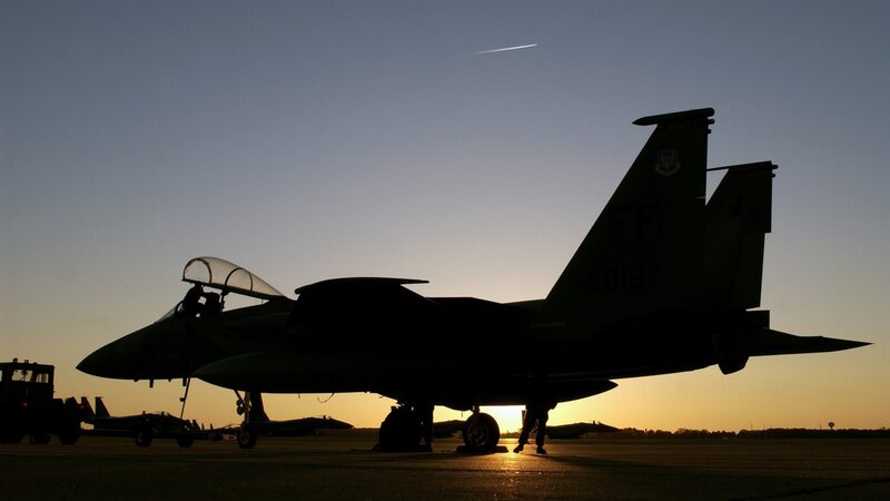 Silhouette of Fighter Jet — Black, Dramatic, Sunset