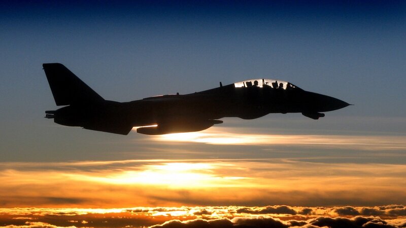Silhouette of Fighter Jet — Blue, Dramatic, Sunset