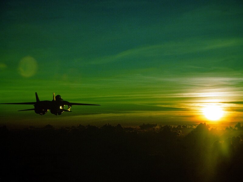 Silhouette of Fighter Jet — Green, Dramatic