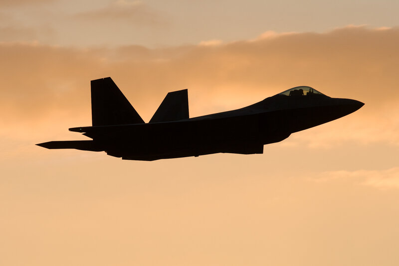 Silhouette of Fighter Jet — Orange, Dramatic, Sunset, Photograph, Sky, Clouds, Black