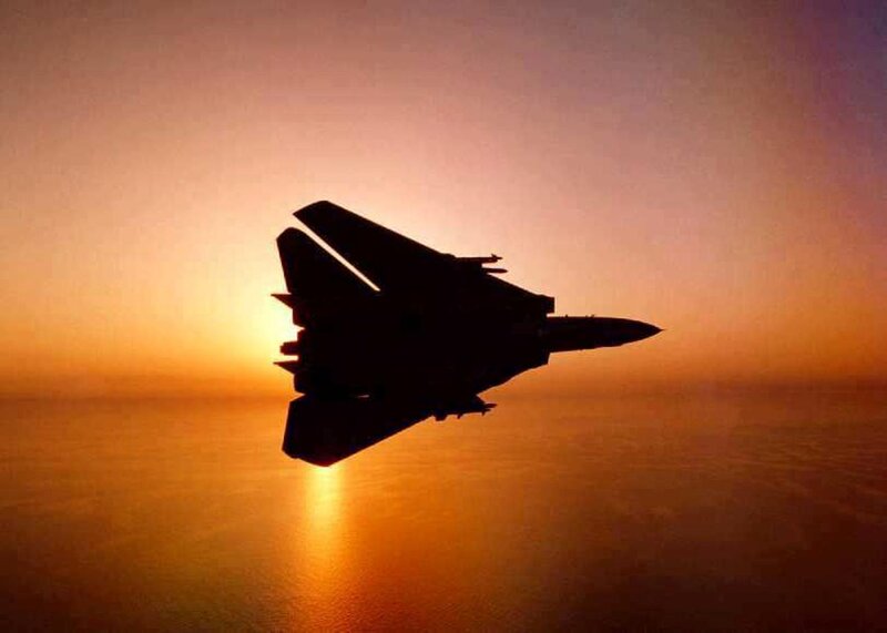 Silhouette of Fighter Jet — Orange, Dramatic, Sunset, Photograph, Sun, Ocean