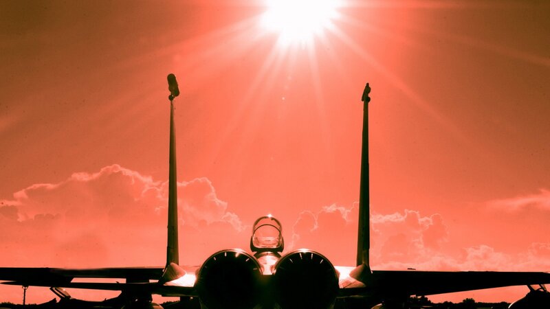 Silhouette of Fighter Jet — Red