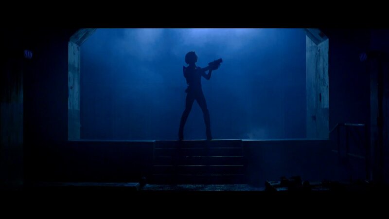 silhouette of figure with weapon