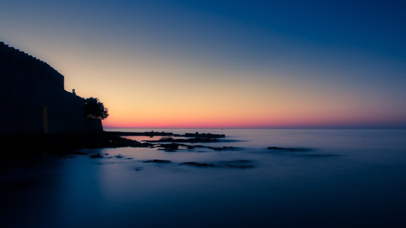 Silhouette of Fortress at Sunset