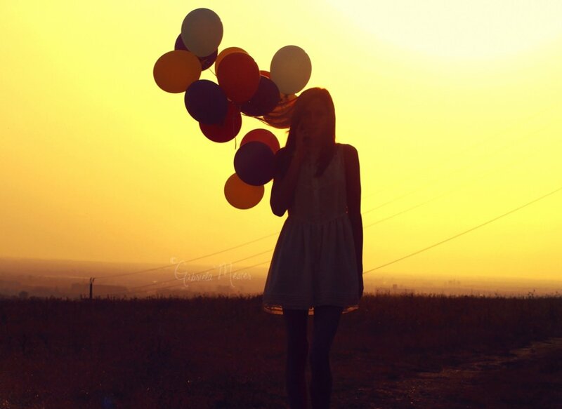 Silhouette of Girl with Balloons — Yellow