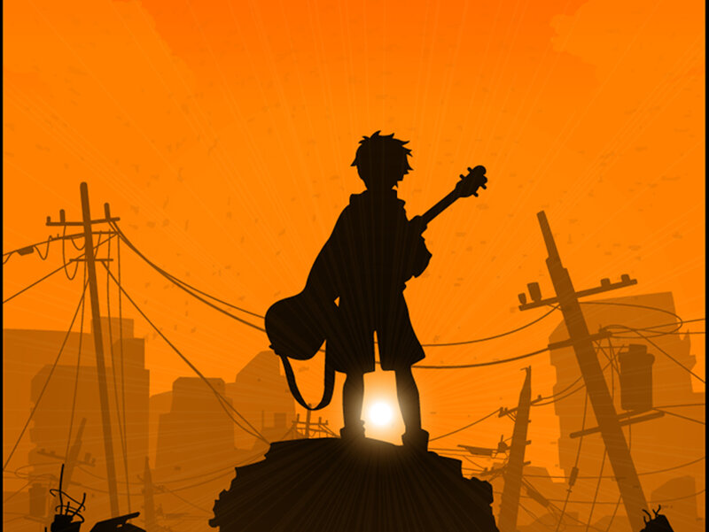 silhouette of guitarist at sunset