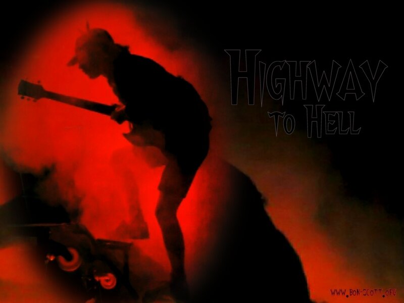 silhouette of guitarist on stage