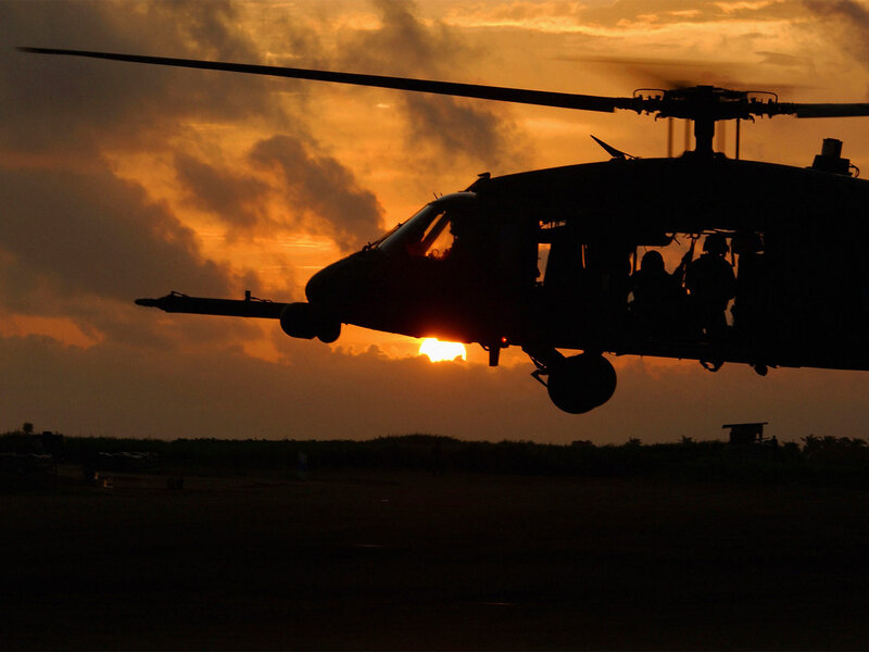 Silhouette of Helicopter — Orange, Dramatic, Sunset