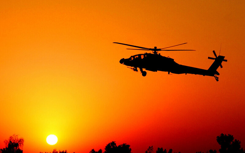 Silhouette of Helicopter — Orange, Dramatic