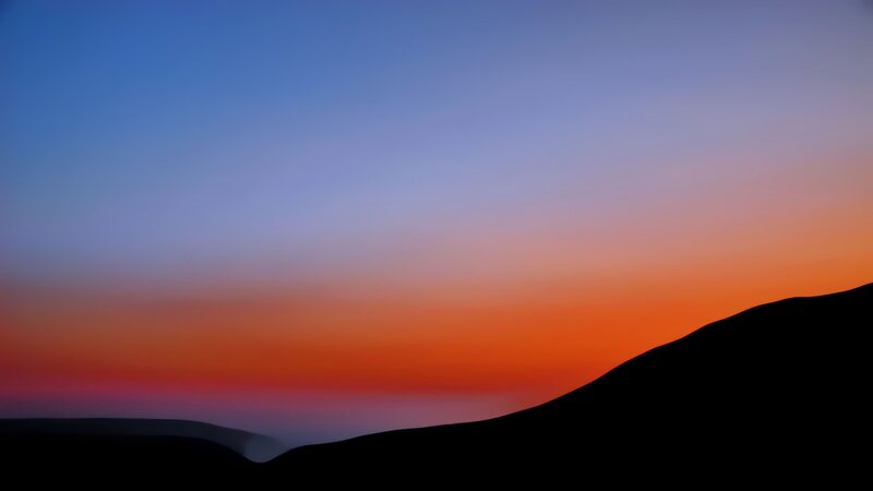 Silhouette of hills at sunset