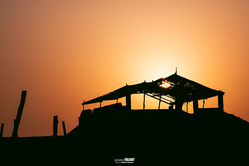 Silhouette of Hut at Sunset — Orange