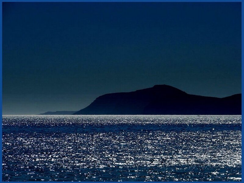 Silhouette of Island at Dusk