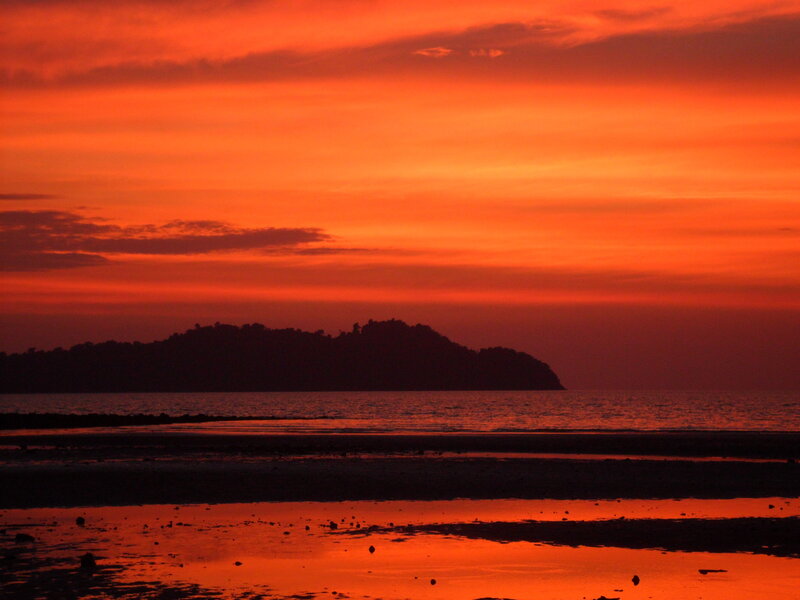 Silhouette of Island at Sunset